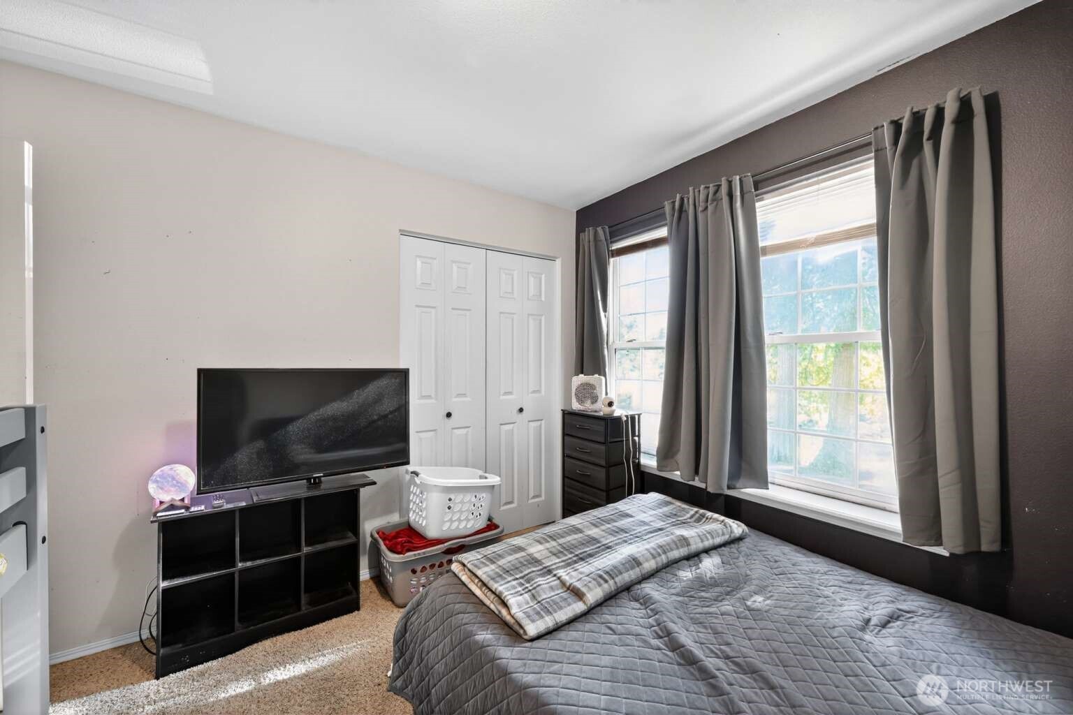 2972 Brook Lane Sedro-Woolley, WA 98284 - Photo 17 of 35 a bedroom with a bed and a flat screen tv