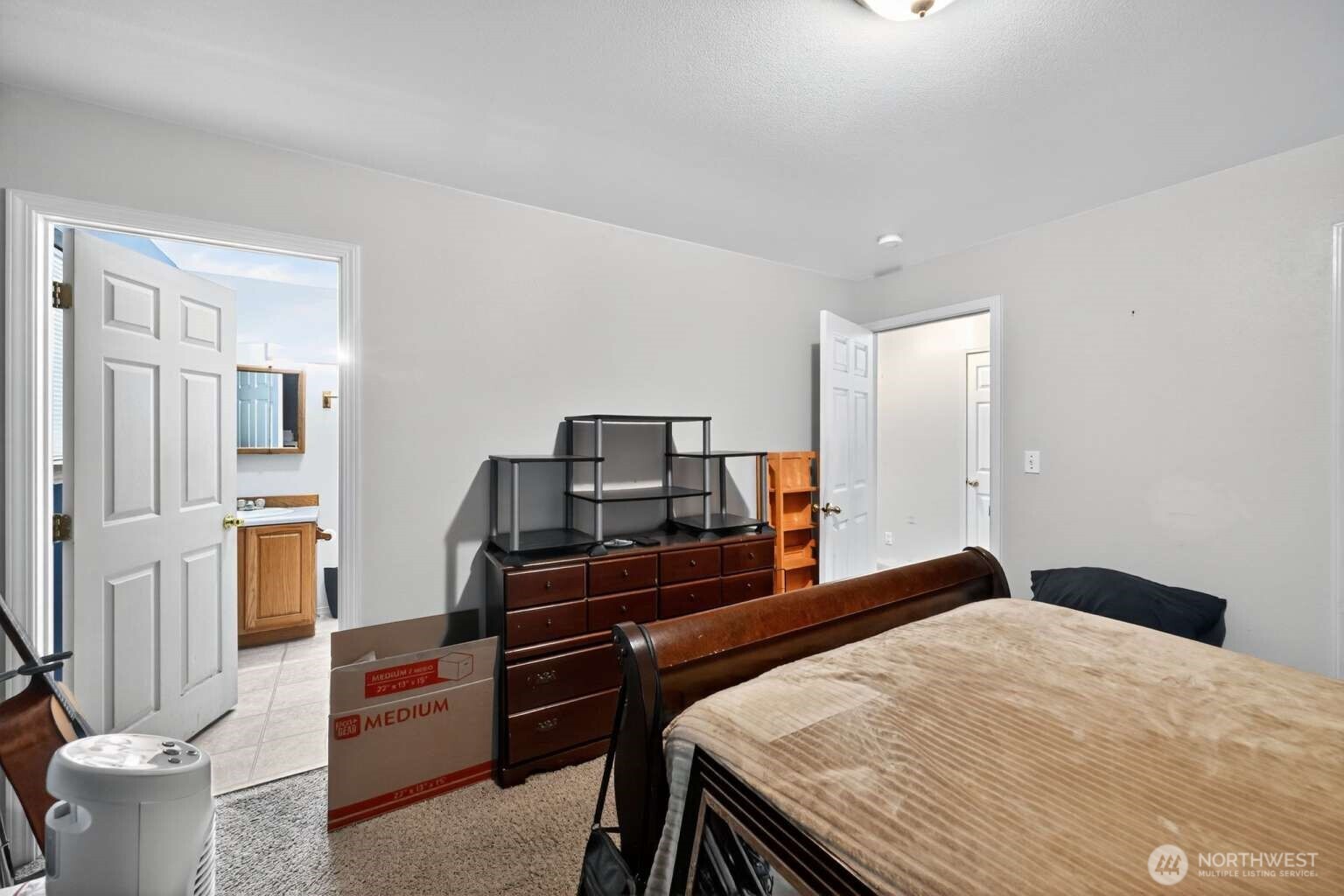 2972 Brook Lane Sedro-Woolley, WA 98284 - Photo 22 of 35 a bedroom with a bed and furniture