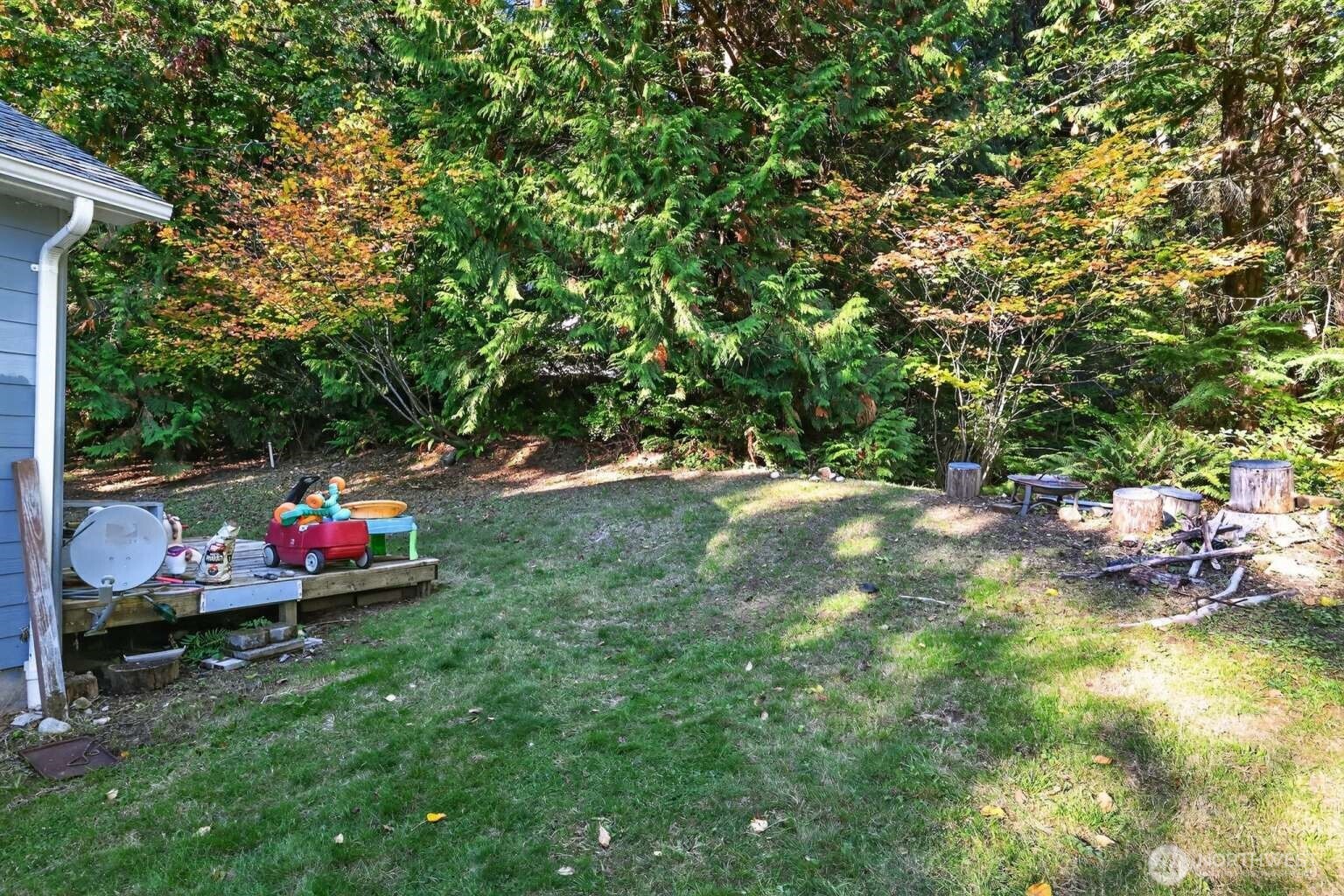 2972 Brook Lane Sedro-Woolley, WA 98284 - Photo 34 of 35 a backyard of a house with seating space