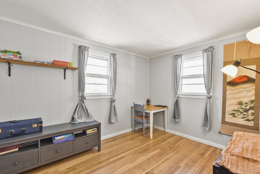 23 Harold Street Worcester, MA 01604 - Photo 14 of 32 a bedroom with furniture and window