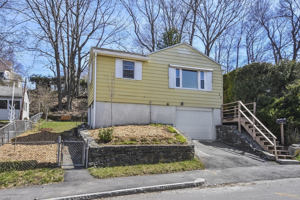 23 Harold Street Worcester, MA 01604 - Photo 2 of 32 a front view of a house with a yard