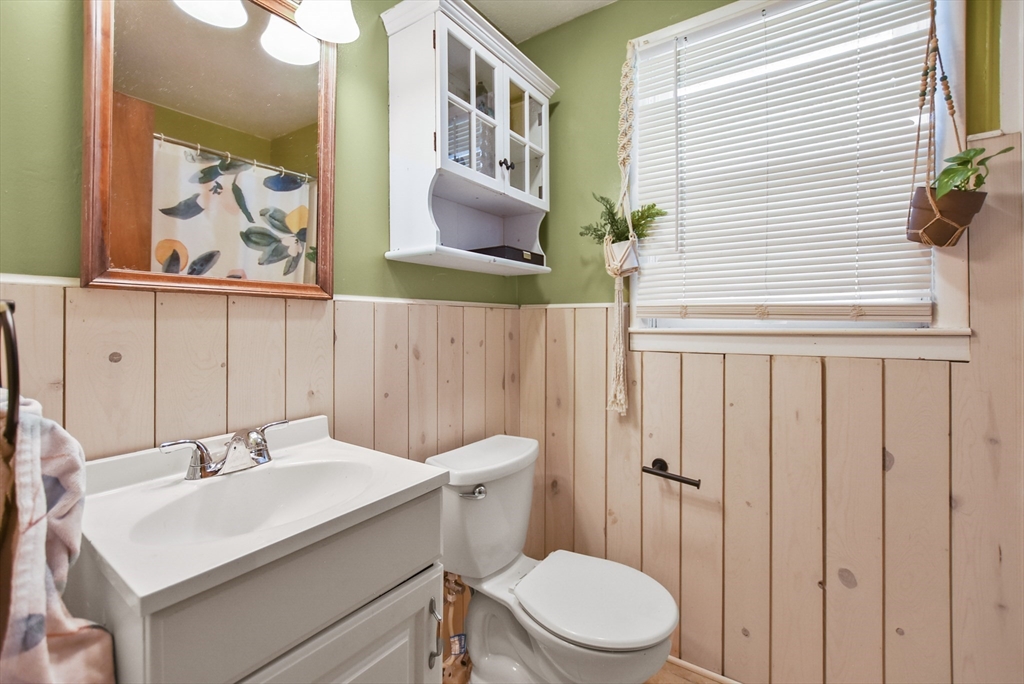 23 Harold Street Worcester, MA 01604 - Photo 24 of 32 a bathroom with a sink a toilet and shower