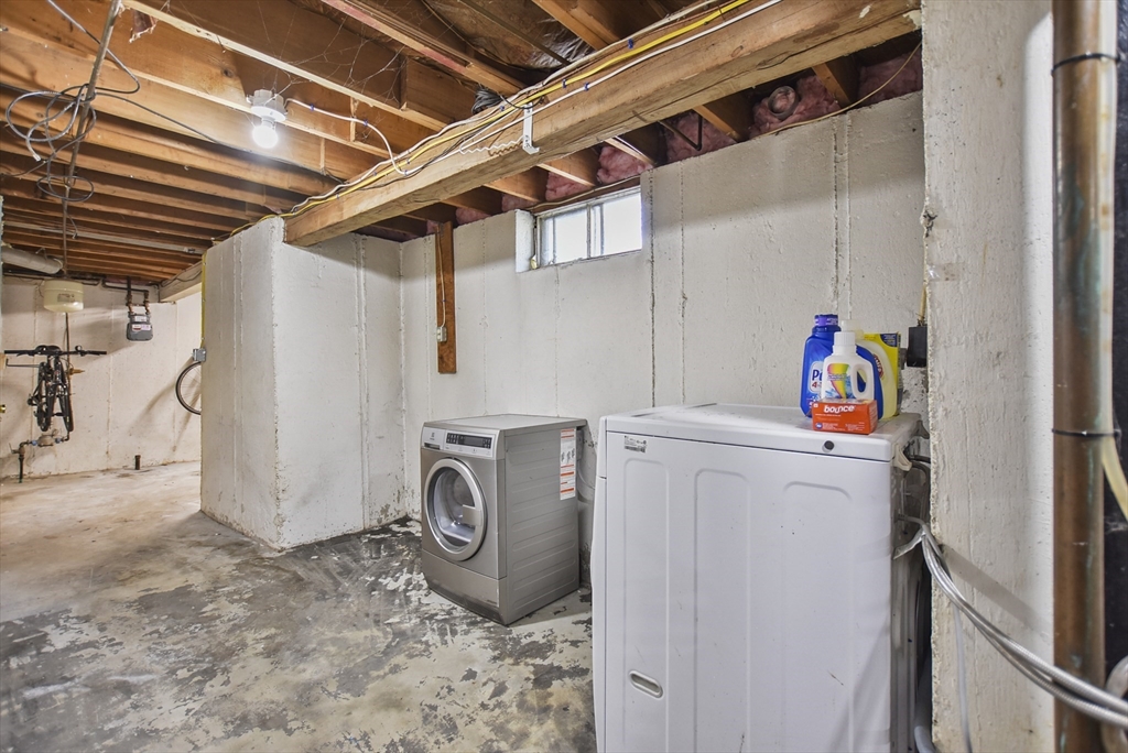 23 Harold Street Worcester, MA 01604 - Photo 26 of 32 a utility room with dryer and washer