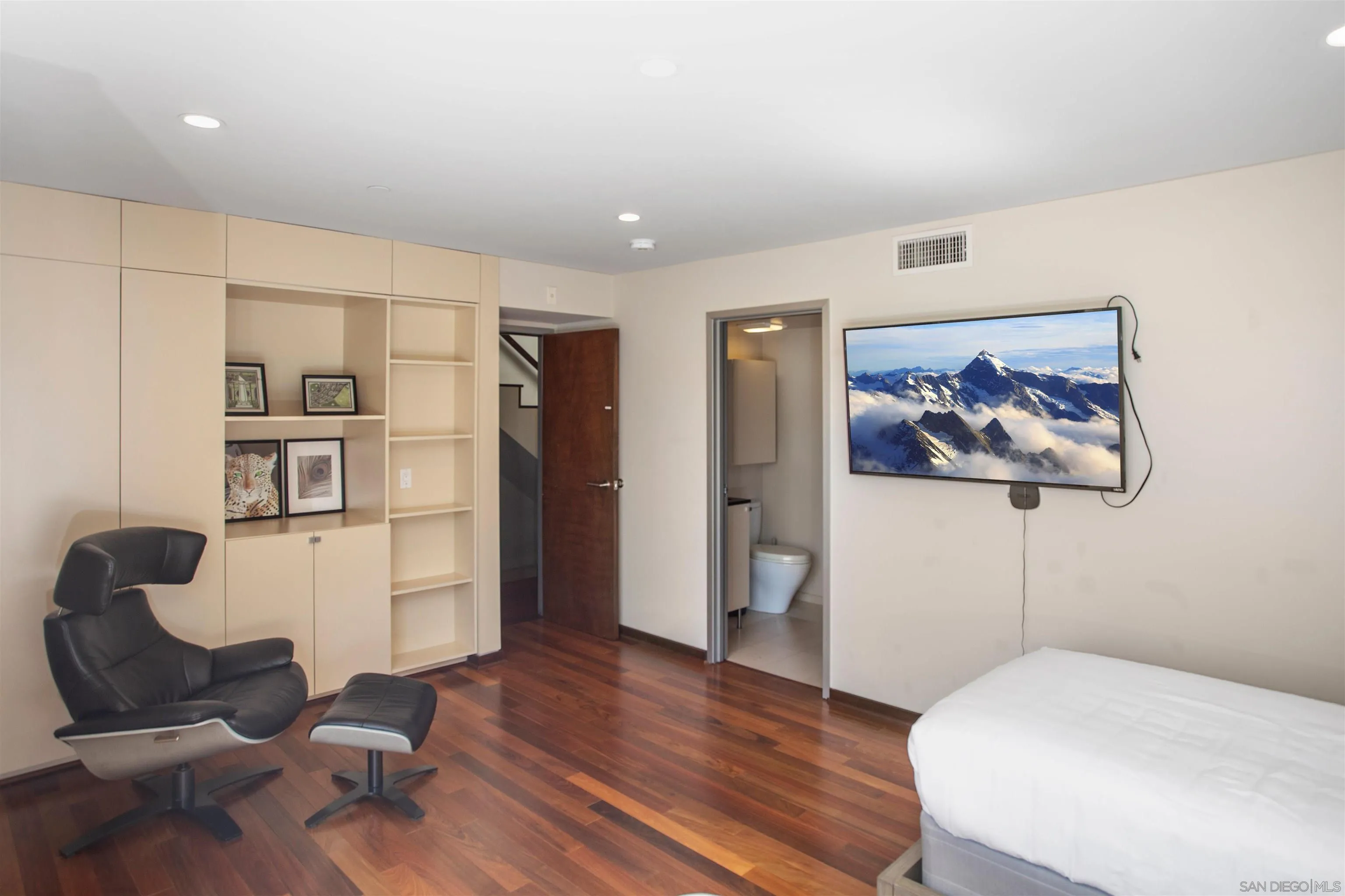 427 Ravina Street La Jolla, CA 92037 - Photo 11 of 36 a bedroom with furniture and wooden floor