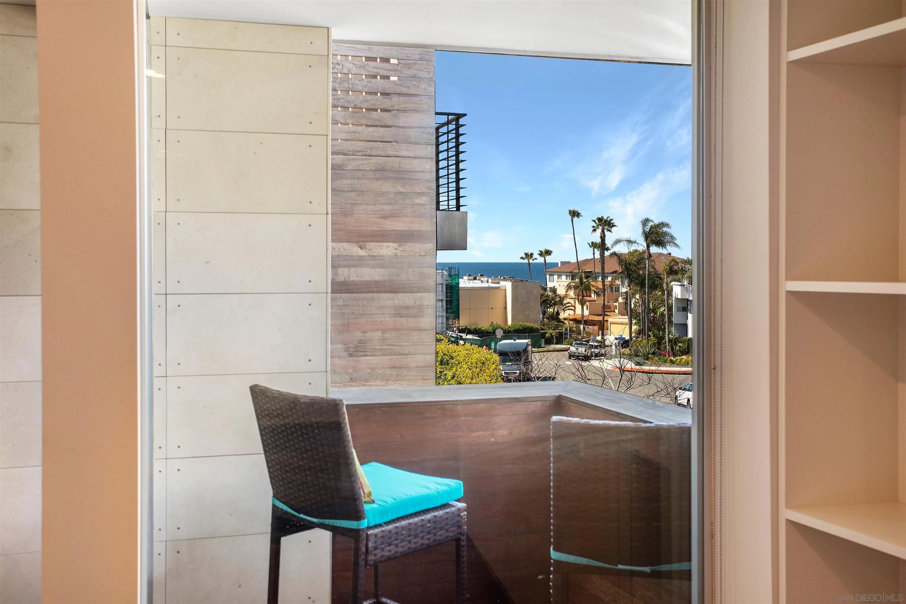 427 Ravina Street La Jolla, CA 92037 - Photo 15 of 36 a balcony with table and chairs