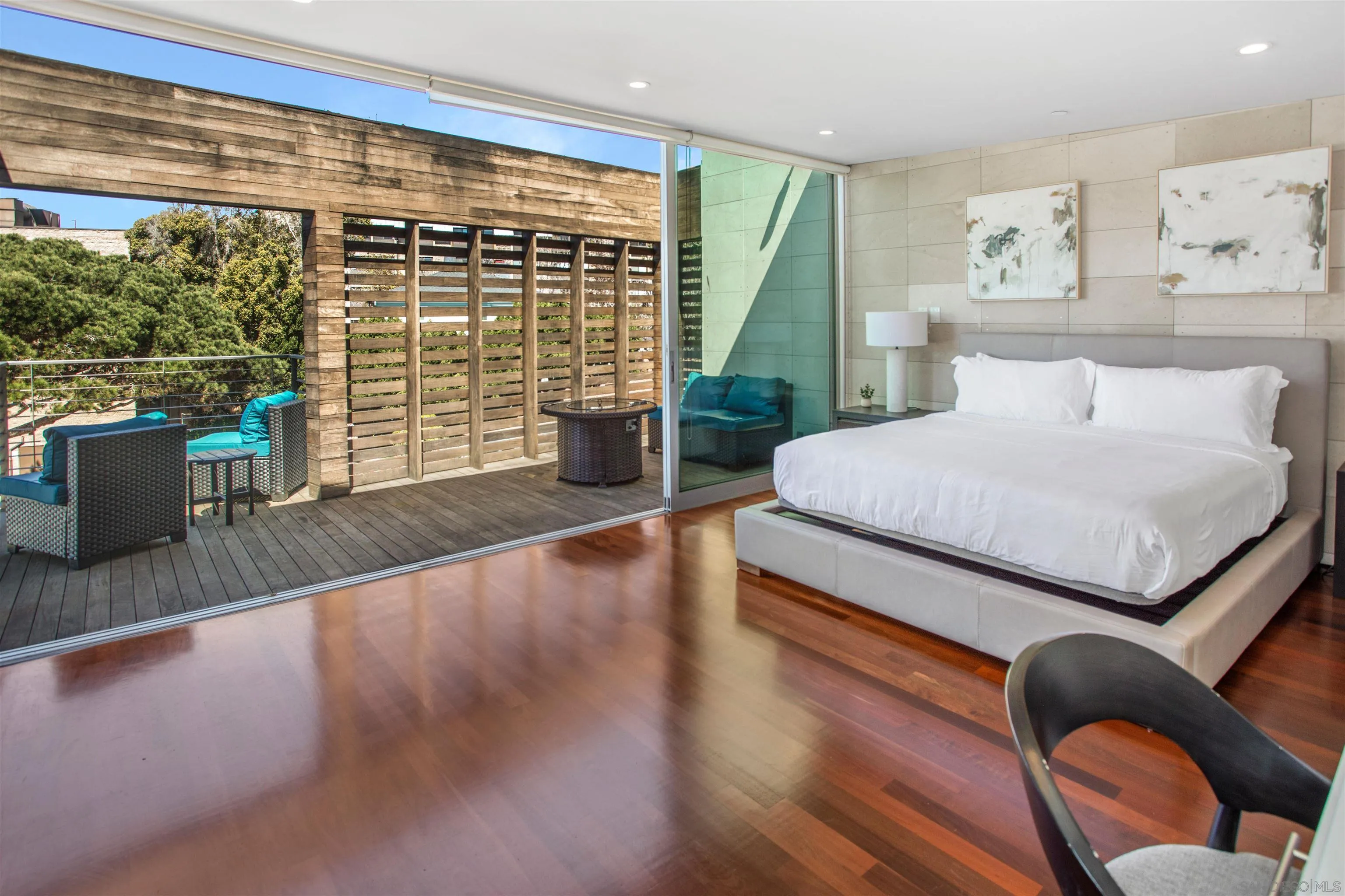 427 Ravina Street La Jolla, CA 92037 - Photo 18 of 36 a living room with furniture and a floor to ceiling window