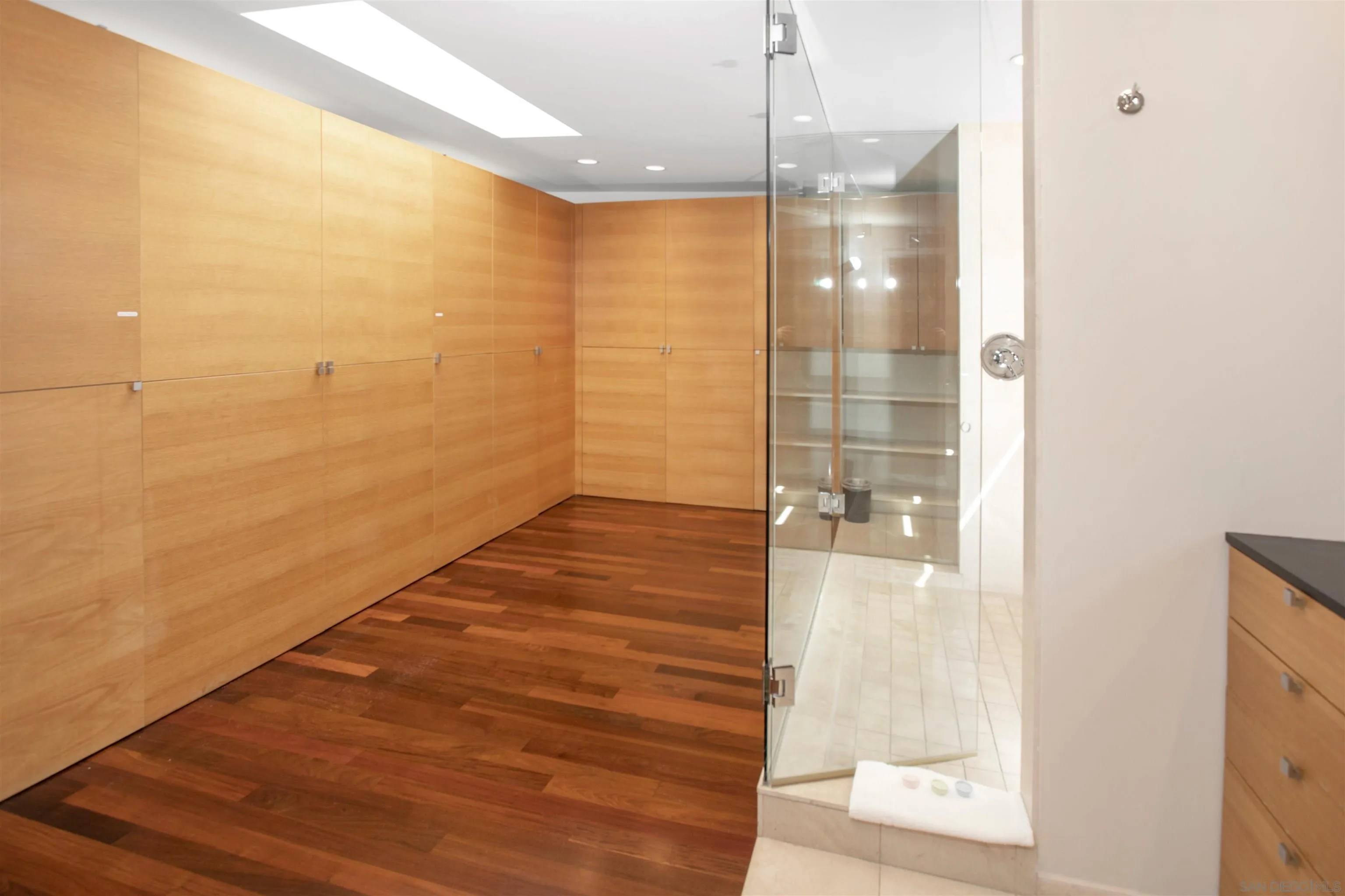 427 Ravina Street La Jolla, CA 92037 - Photo 22 of 36 a bathroom with a glass shower door