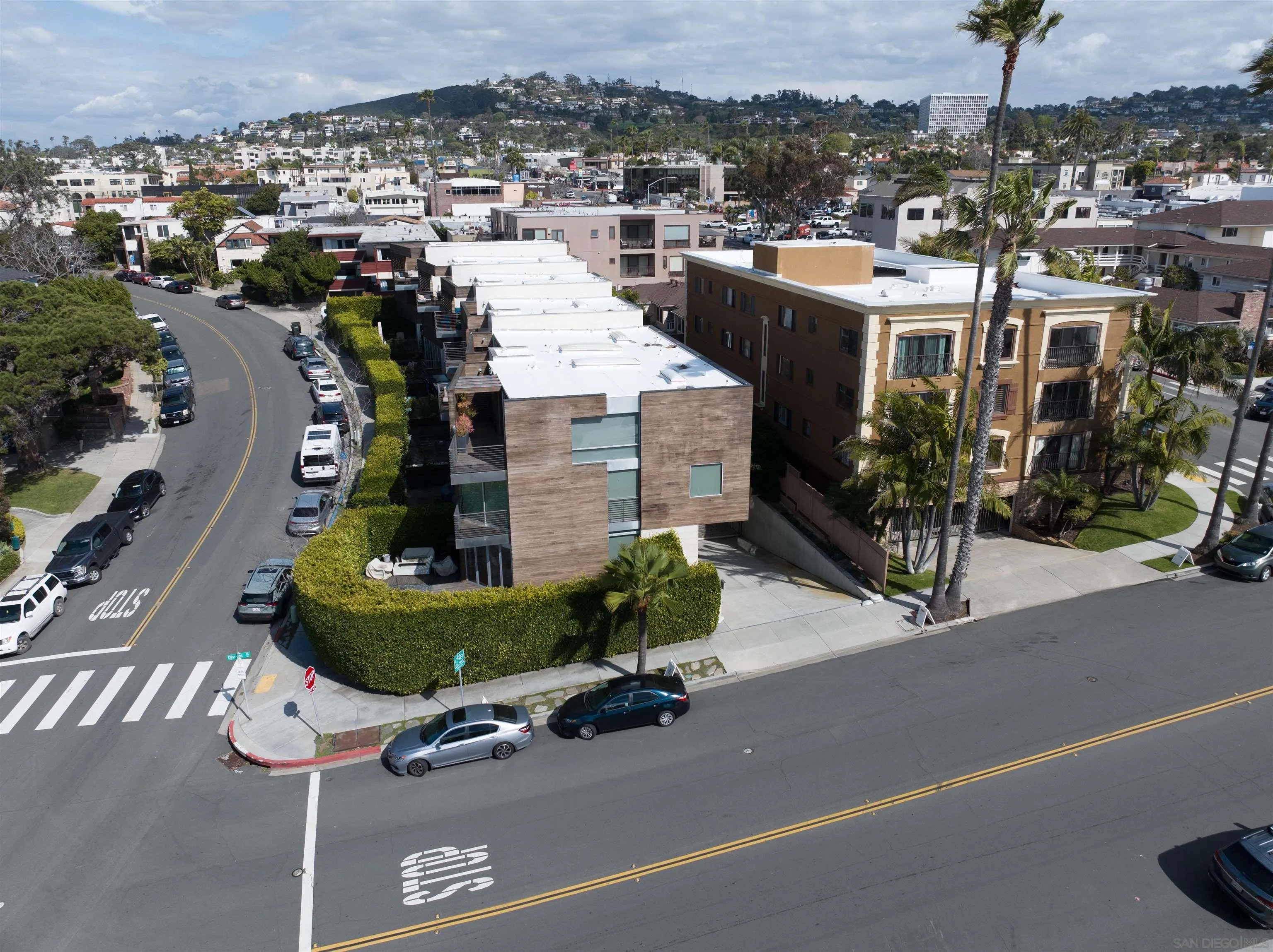 427 Ravina Street La Jolla, CA 92037 - Photo 36 of 36 an aerial view of a house with a garden and parking spaces