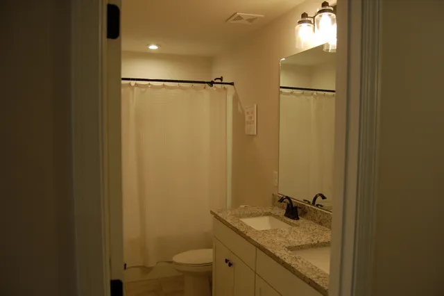 a room with windows and a table