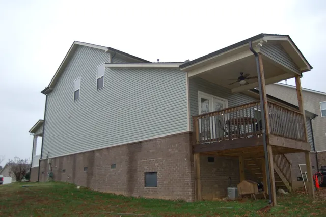 a backyard of a house with lots of green space