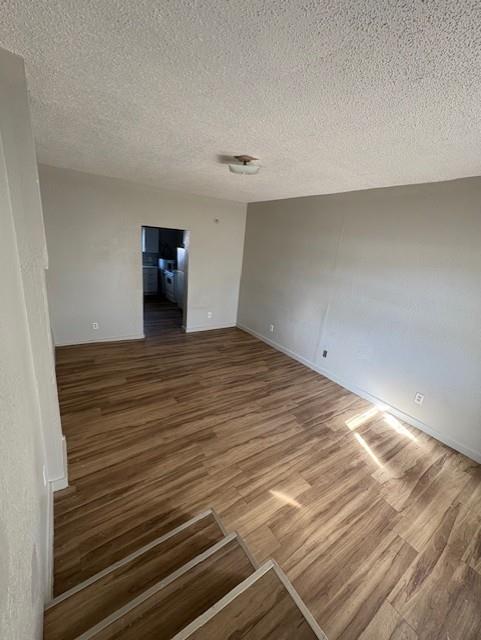 709 Grape Street, Unit C Abilene, TX 79601 - Photo 2 of 8 a view of a room with wooden floor