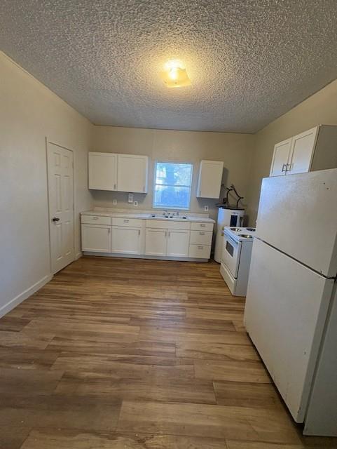 709 Grape Street, Unit C Abilene, TX 79601 - Photo 3 of 8 a room with storage and utility