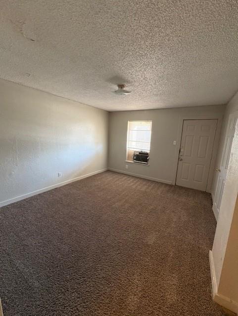 709 Grape Street, Unit C Abilene, TX 79601 - Photo 6 of 8 an empty room with a empty space and windows