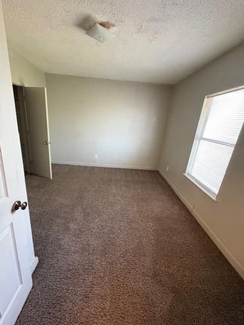 709 Grape Street, Unit C Abilene, TX 79601 - Photo 7 of 8 an empty room with windows