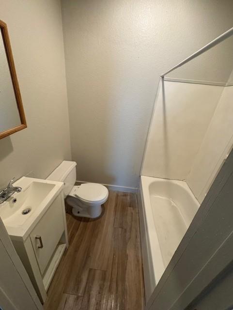 709 Grape Street, Unit C Abilene, TX 79601 - Photo 8 of 8 a bathroom with a sink and a toilet