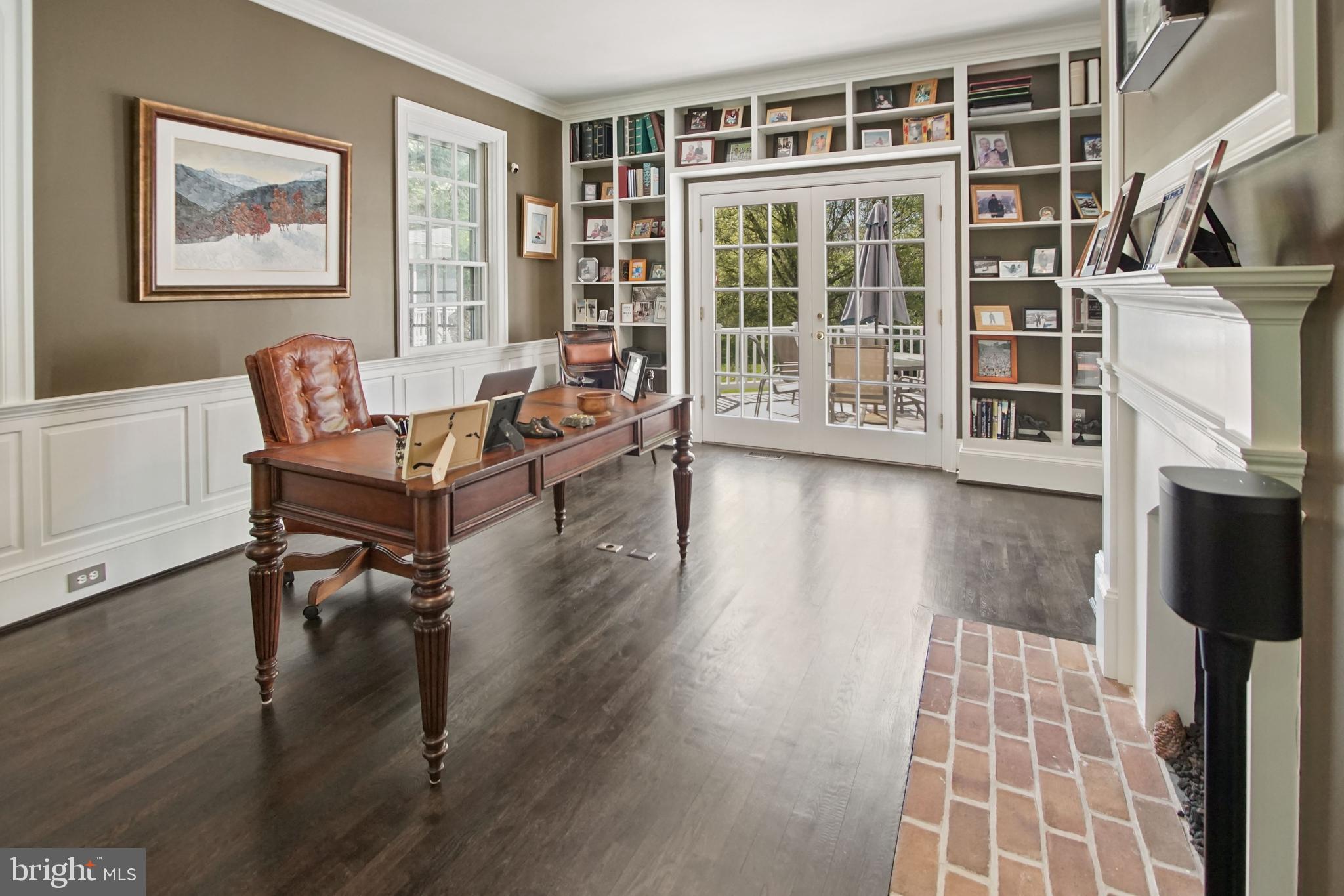 10306 Cutters Lane Potomac, MD 20854 - Photo 7 of 58 Built ins and a fireplace in this space