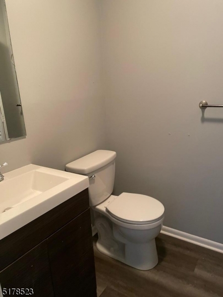 2 Evergreen Drive Clinton, NJ 08809 - Photo 12 of 18 a white toilet sitting next to a bathroom sink