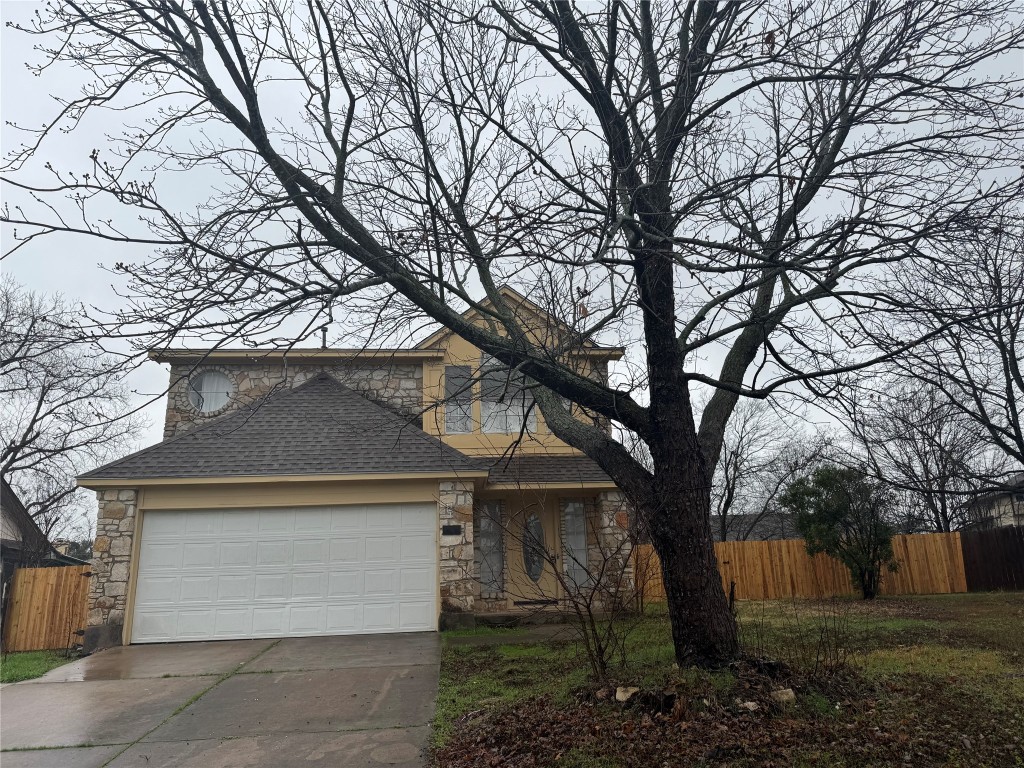 1514 Clearview Loop Round Rock, TX 78664 - Photo 1 of 31 a view of a house with a large tree