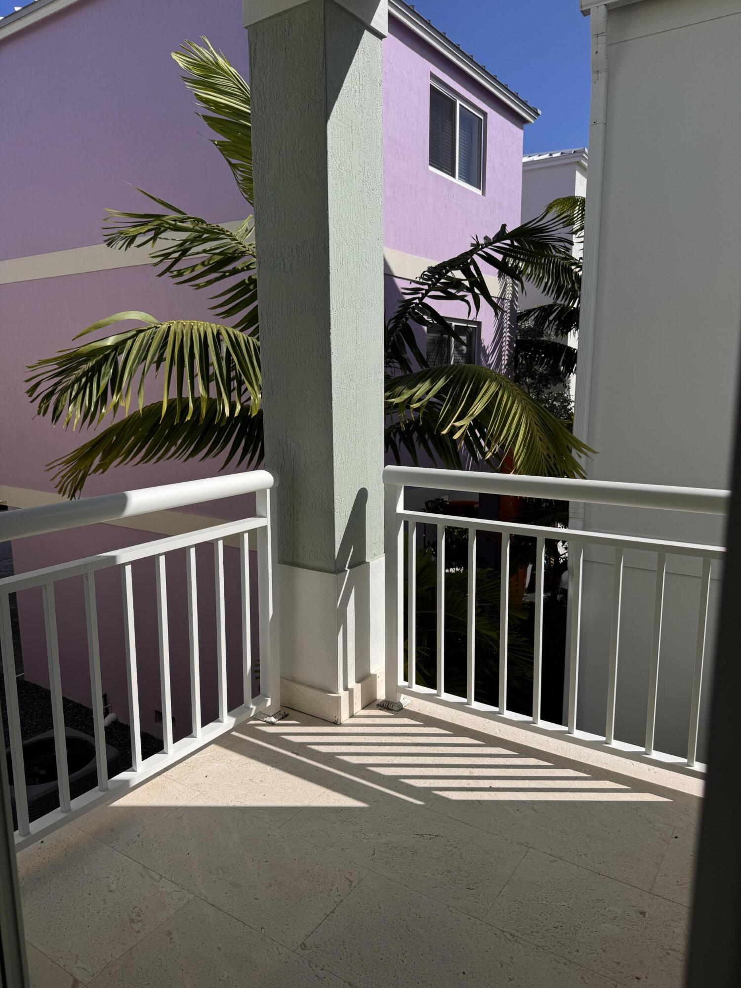94825 Overseas Highway, Unit 58 Key Largo, FL 33037 - Photo 12 of 41 a view of a house with a window