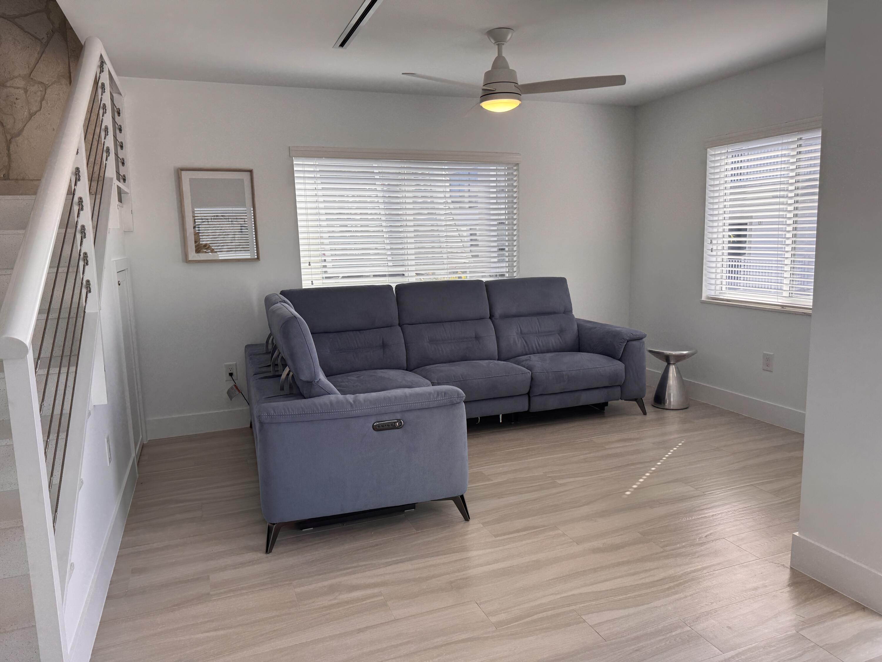 94825 Overseas Highway, Unit 58 Key Largo, FL 33037 - Photo 5 of 41 a living room with furniture and a window