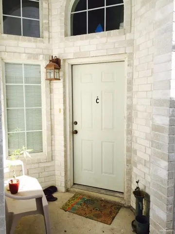 a view of a closet area with an empty room
