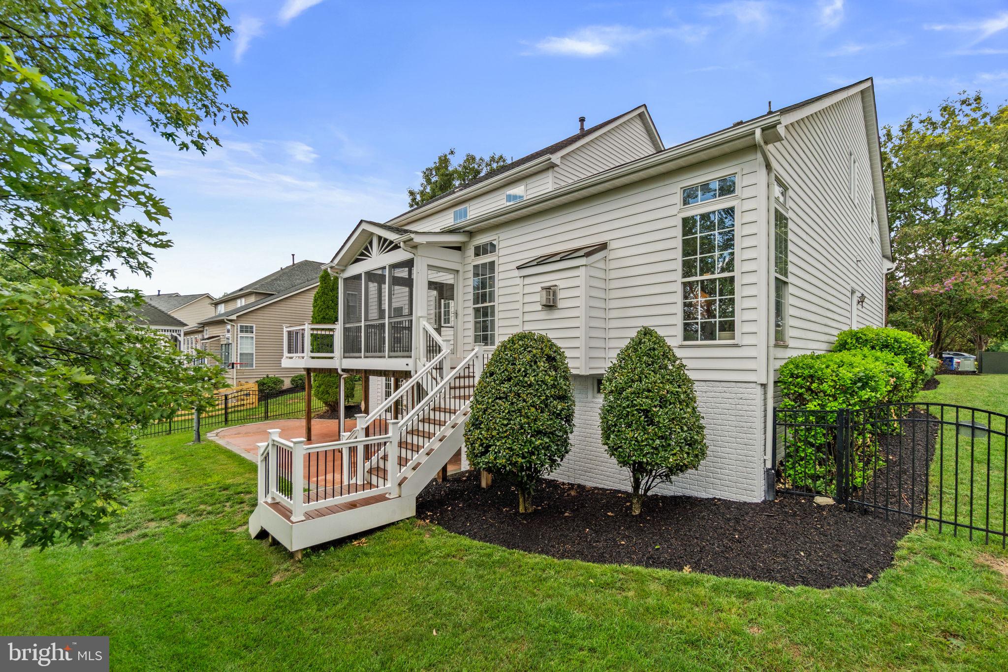 9237 Charterhouse Road Frederick, MD 21704 - Photo 57 of 89 Fully landscaped backyard and steps to deck