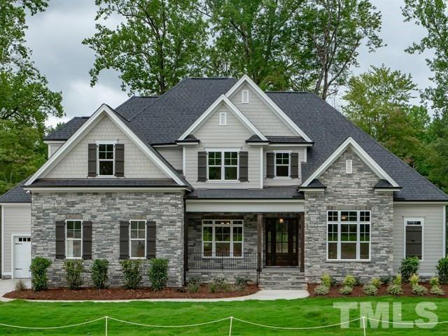 1425 Starry Night Court Raleigh, NC 27613 - Photo 1 of 33 a front view of a house with a yard