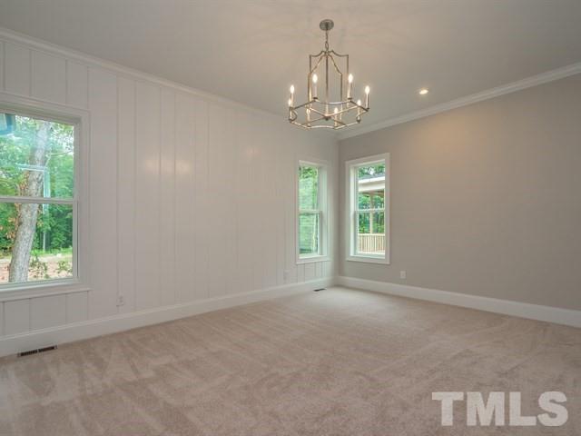 1425 Starry Night Court Raleigh, NC 27613 - Photo 17 of 33 a view of an empty room with a window