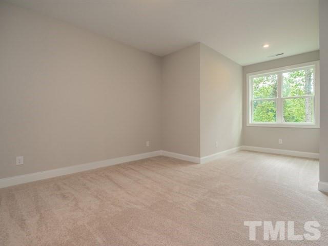 1425 Starry Night Court Raleigh, NC 27613 - Photo 27 of 33 an empty room with windows