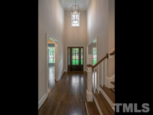 1425 Starry Night Court Raleigh, NC 27613 - Photo 3 of 33 a view of entryway with wooden floor