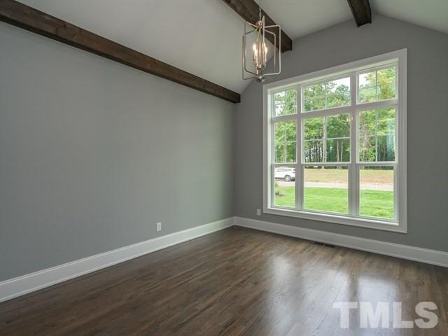1425 Starry Night Court Raleigh, NC 27613 - Photo 5 of 33 a view of empty room with wooden floor and fan