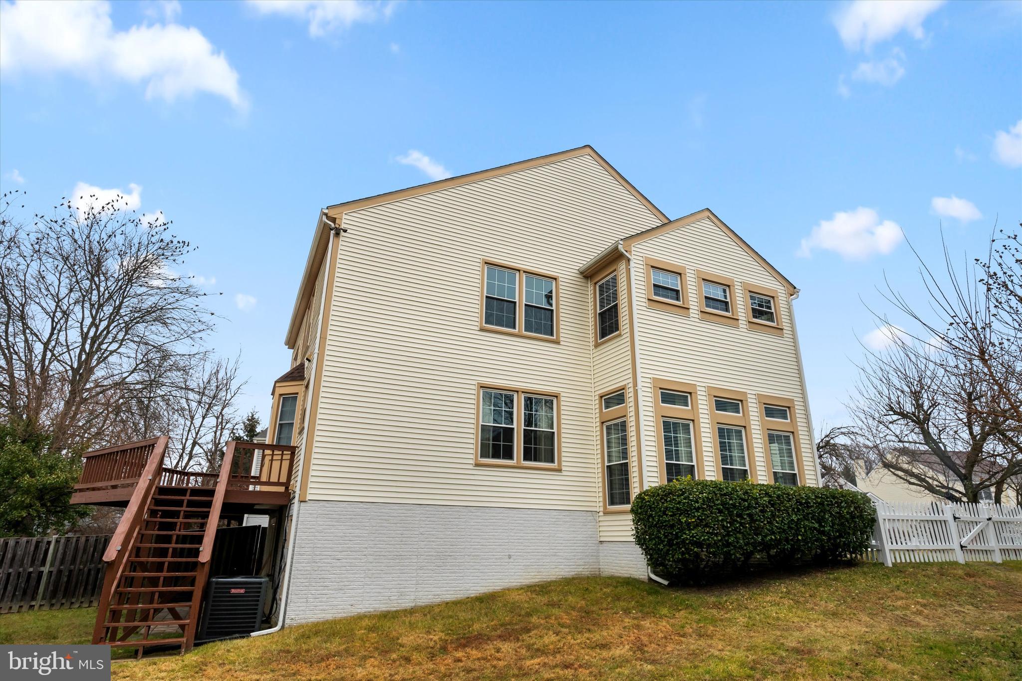 14810 Cherry Leaf Terrace Silver Spring, MD 20906 - Photo 28 of 35 a view of a house with a yard