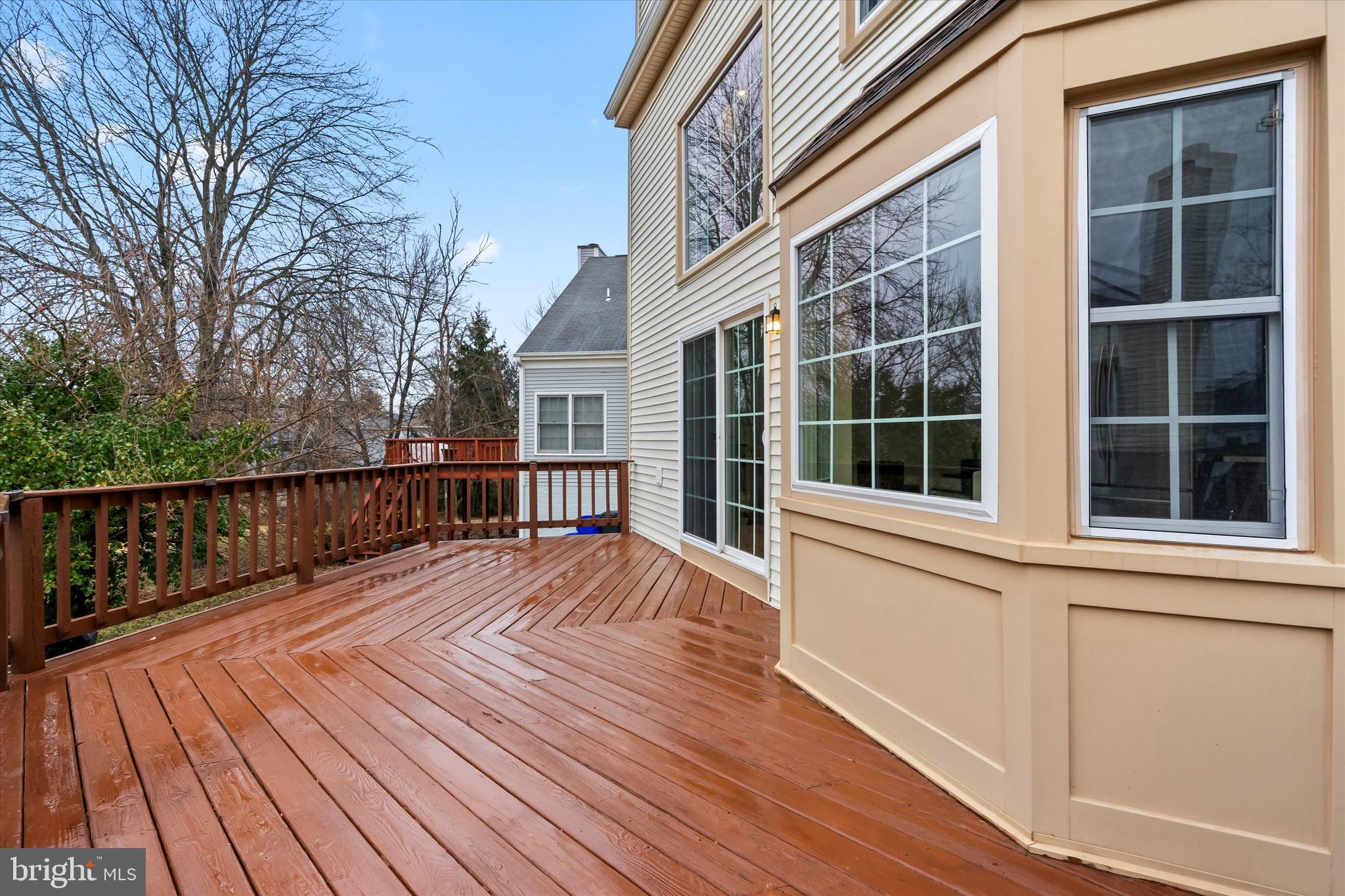 14810 Cherry Leaf Terrace Silver Spring, MD 20906 - Photo 29 of 35 a view of balcony with wooden floor and fence