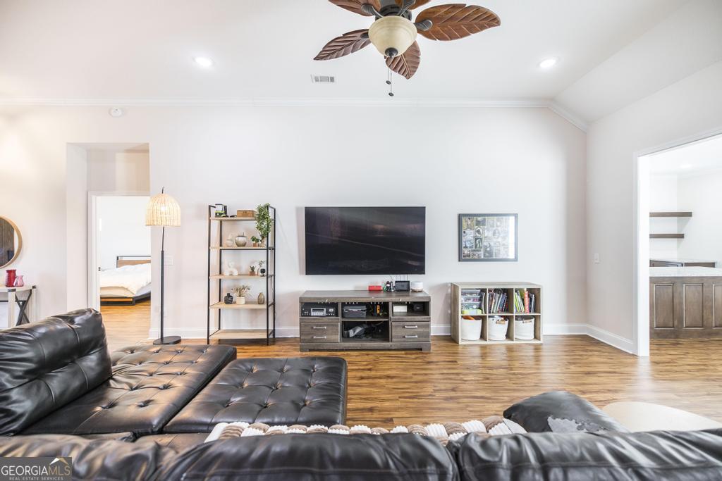 219 Rowland Circle Byron, GA 31008 - Photo 11 of 47 a living room with furniture and a flat screen tv