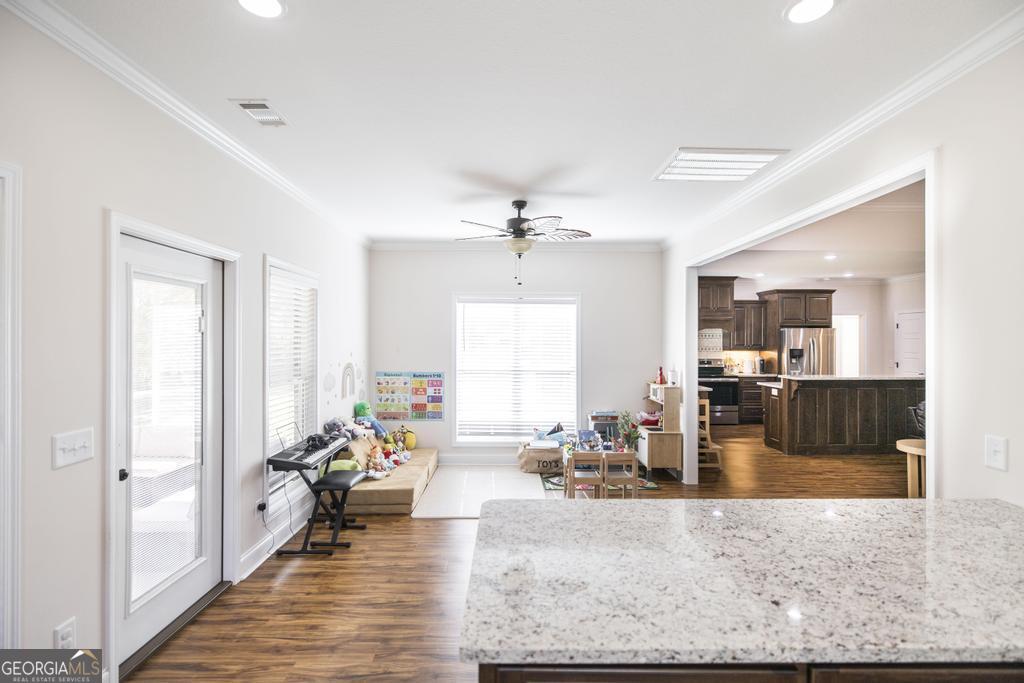 219 Rowland Circle Byron, GA 31008 - Photo 29 of 47 a living room with furniture window and wooden floor