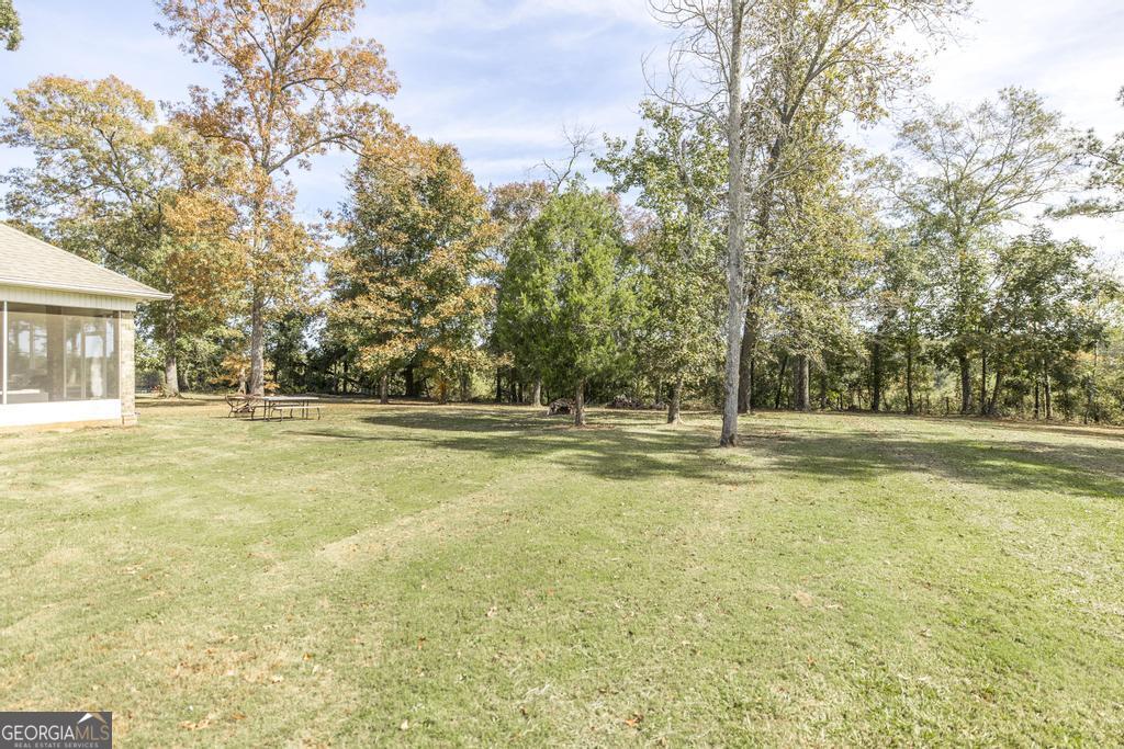 219 Rowland Circle Byron, GA 31008 - Photo 38 of 47 a view of swimming pool with trees