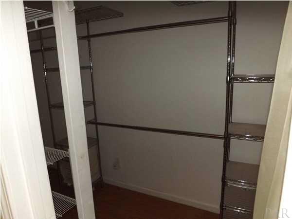 5538 Allie Rae Street Milton, FL 32570 - Photo 15 of 24 The Master Bedroom has a walk in closet with shelving