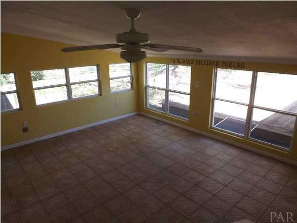 5538 Allie Rae Street Milton, FL 32570 - Photo 16 of 24 Nice open Florida Room