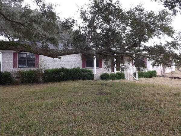 A view from the side of the home looking towards the drive way