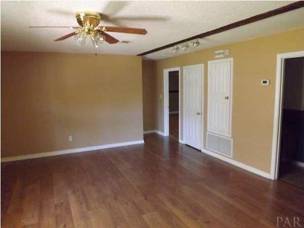 Nice floors in the Living Room lead you into the rest of the home