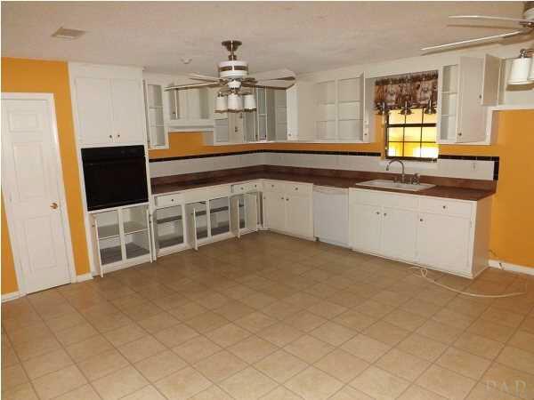 Kitchen provides with open space and plenty of room for a butchers block