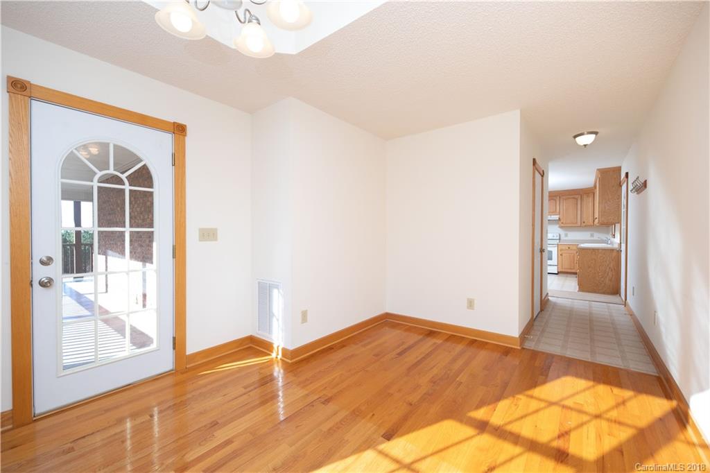 2746 Sawmill Road Hickory Grove, SC 29717 - Photo 11 of 27 a view of a room with wooden floor and a bathroom