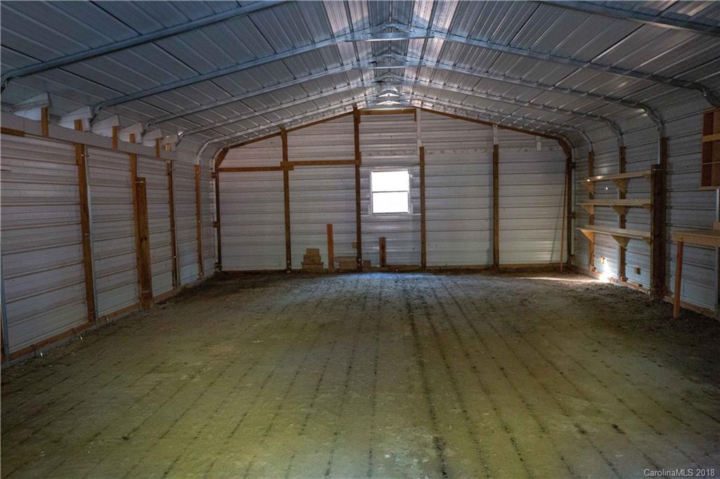 2746 Sawmill Road Hickory Grove, SC 29717 - Photo 24 of 27 a view of an empty room with a garage