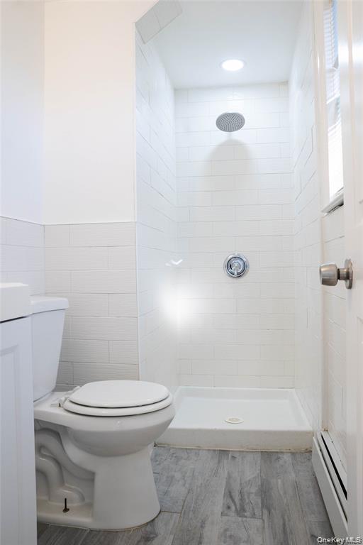 58 Hauppauge Road Hauppauge, NY 11788 - Photo 20 of 23 a bathroom with a toilet and a shower