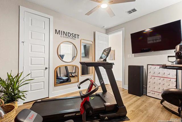 a view of a livingroom with furniture and a flat screen tv