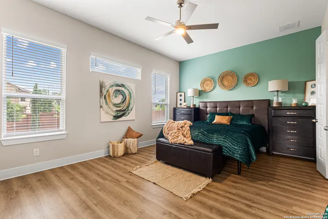 a bed room with furniture and a window