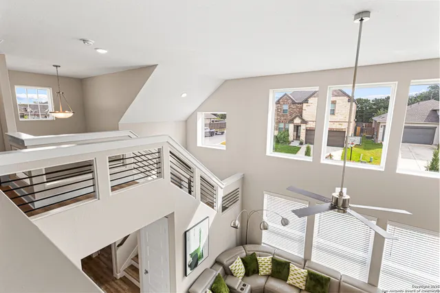 a view of a workspace with furniture