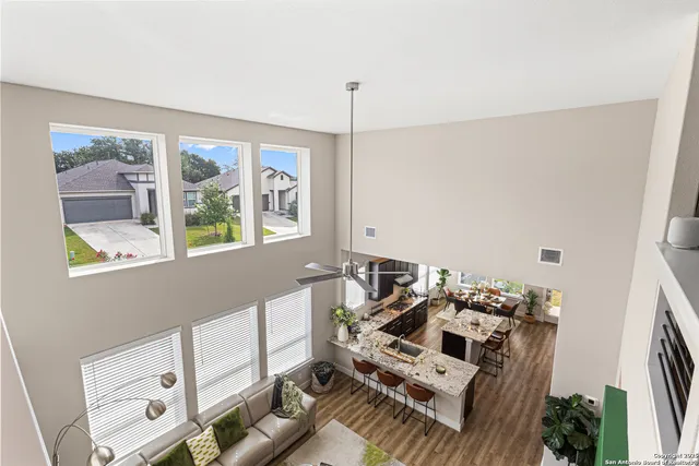 a view of a living room and entryway