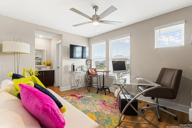a living room with furniture and a table