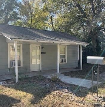 1141 6th Street Lancaster, SC 29720 - Photo 1 of 18 a front view of a house with a yard